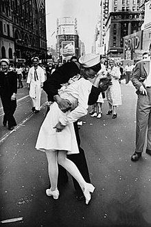 V-J Day in Times Square is a photograph by Alfred Eisenstaedt that portrays a U.S. Navy sailor embracing and kissing a total stranger —a dental assistant—on Victory over Japan Day (