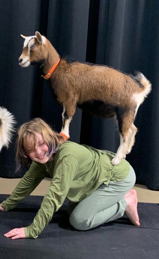 Author's goddaughter Nerys with goat