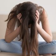 Young woman struggling with substance abuse problems. fizkes/Shutterstock