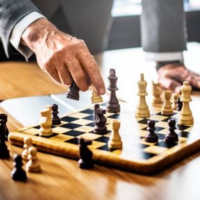 Beating stigma requires strategies like a game of chess.  Who should lead the game?