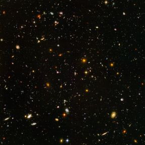 The Hubble Ultra Deep Field. Almost 10,000 galaxies. Looking back to when the universe was less than a billion years old.