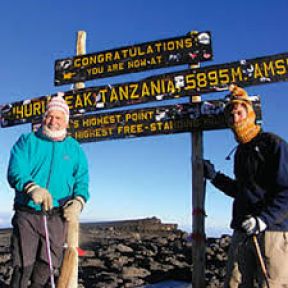 Gutkind and son at the summit of another mountain, Mount Kilimanjaro in Tanzania