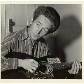 "This machine kills fascists" emblazoned on Woody Guthrie's guitar