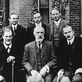 Freud, seated left of picture with Jung seated at the right of the picture. 1909