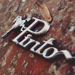 Rusty Ford Pinto logo