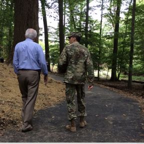 Soldier and friend walking the Bethesda Walter Reed National Military Medical Center "Green Road"