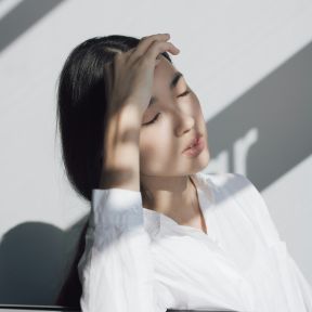 Woman with Migraine Suffering