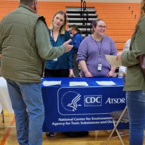 CDC Epidemic IntelliCDC officials speaking with community members about chemical exposures after a train derailment in East Palestine, Ohio.