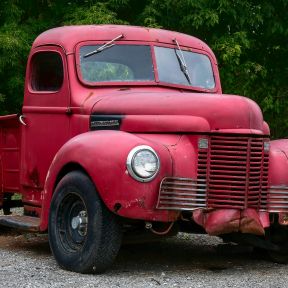 Photo-of-old-red-truck by Heru Vision