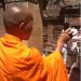 Buddhist monk with cell phone