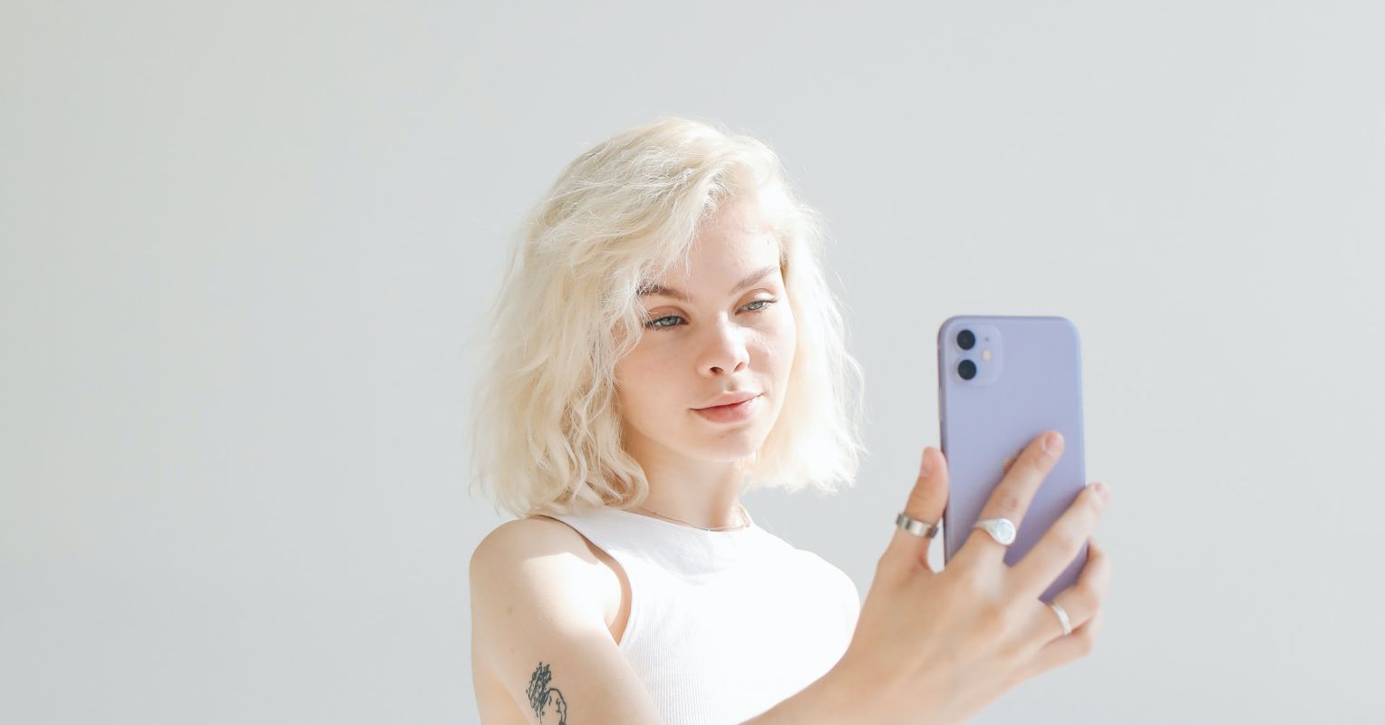 'a woman taking a selfie'