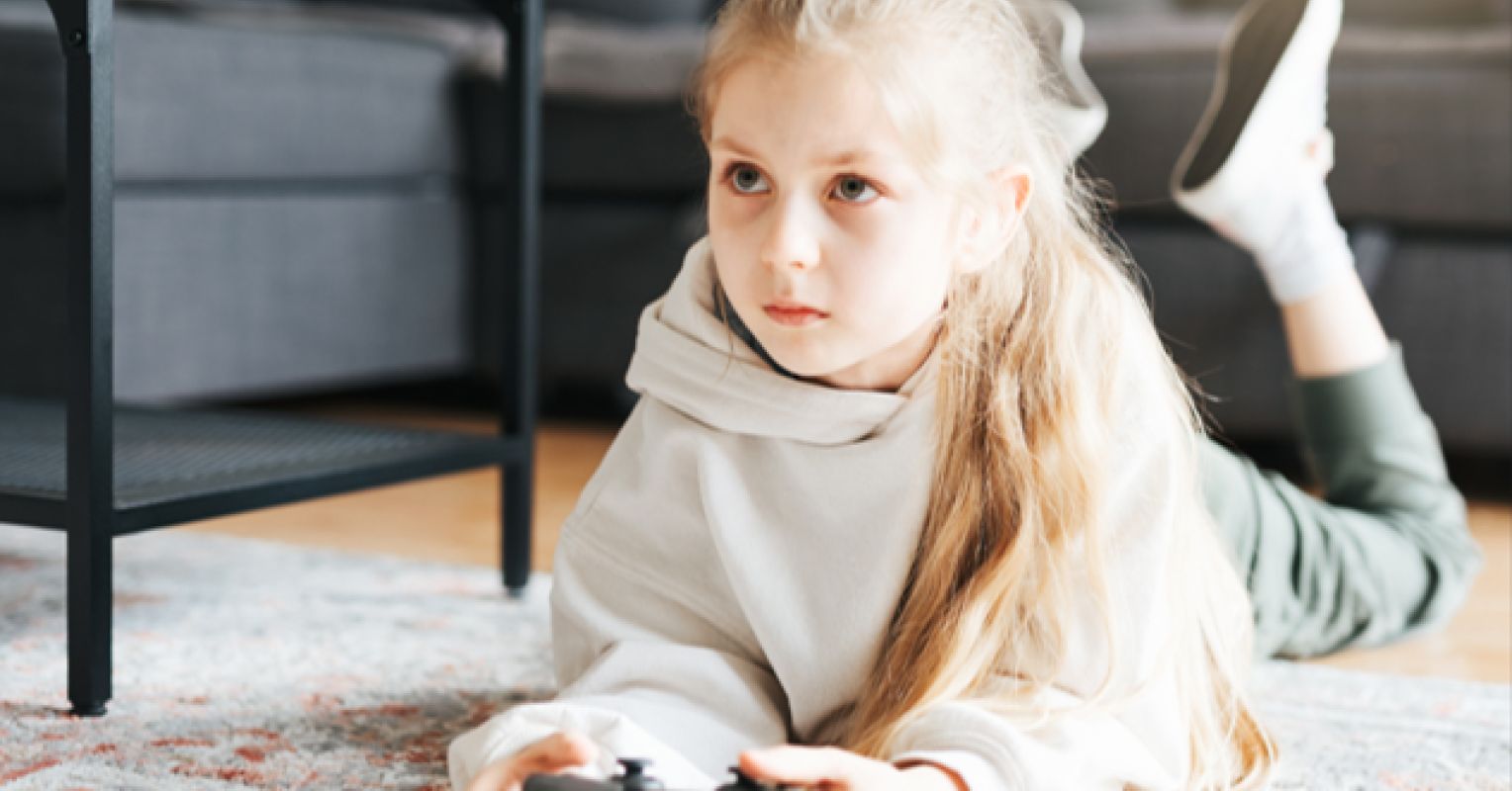 little girl playing video games
