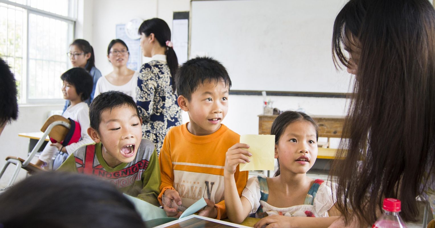 Who Makes the Better Teacher, Humans or AI?