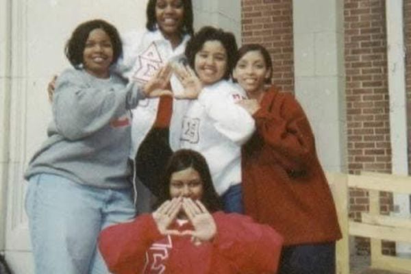 The author (center in white) with four of her line sisters on Dec. 5, 1999 - the day after they were initiated into DST.