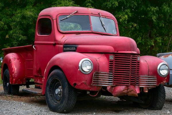 Photo-of-old-red-truck by Heru Vision