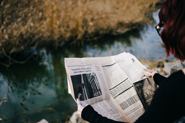 Reading the paper while the brook flows by