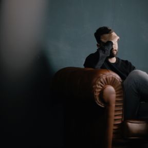 Man Suffering with Migraine